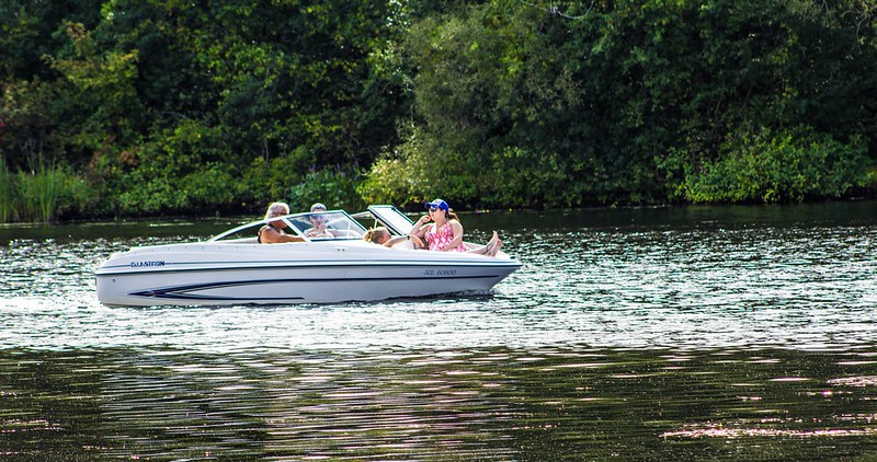 Image of a family cruising in a boat