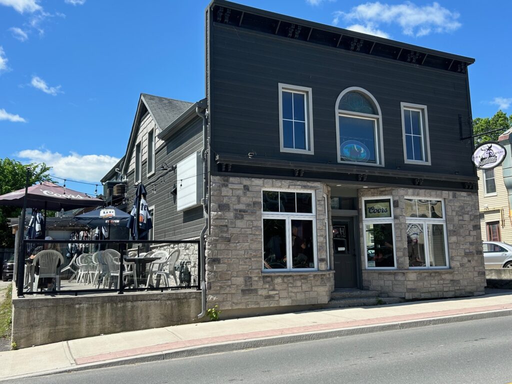 view of the side patio and the front of the Thirsty Moose 
